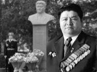 Суюмбаев, Ахматбек Суттубаевич